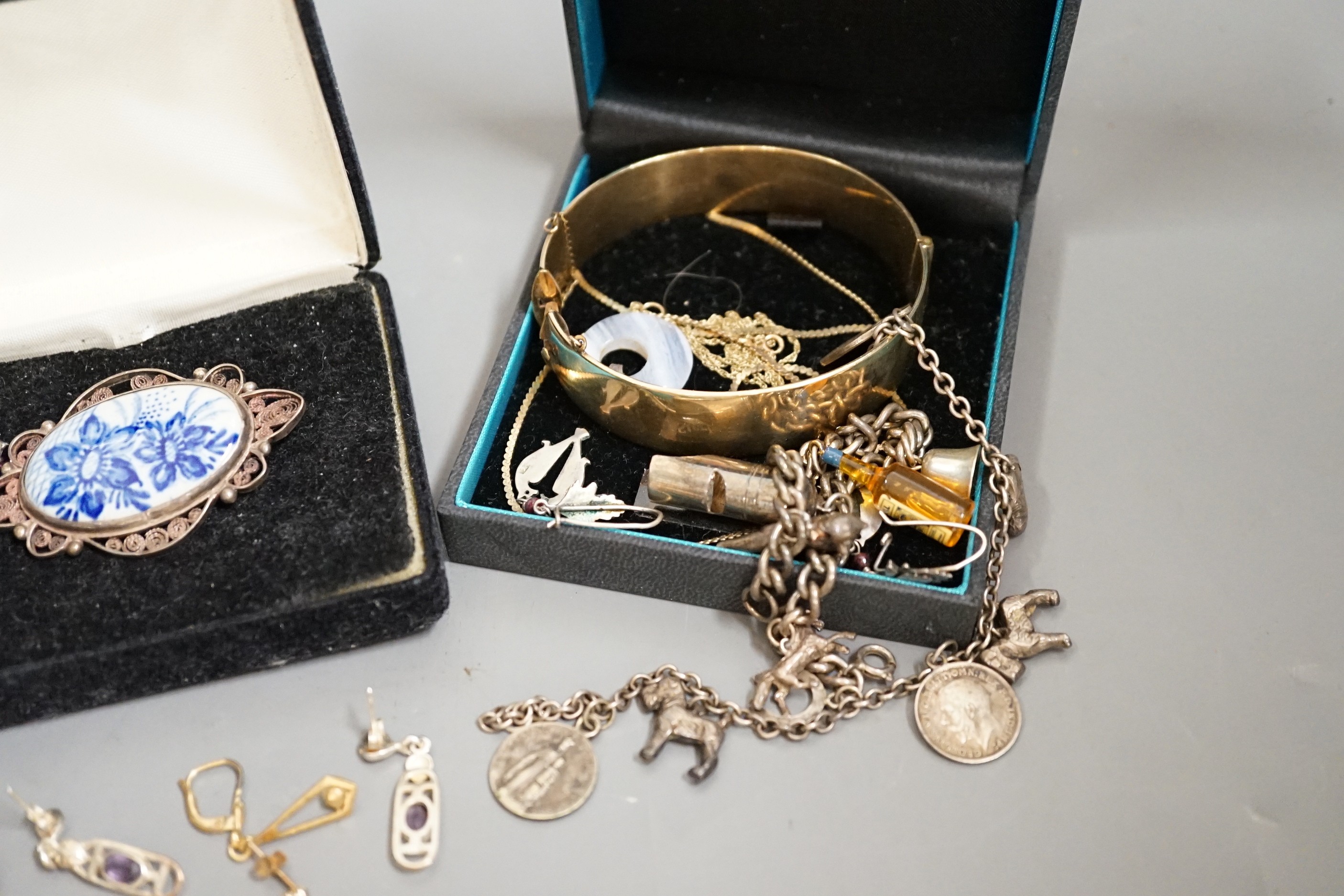 A 9ct mounted oval cameo shell brooch, and other assorted jewellery including, costume, a white metal charm bracelet, 925 earrings etc.